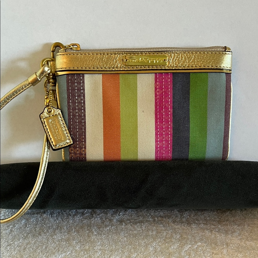 Coach Poppy striped wristlet